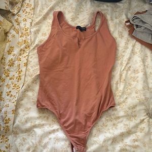 Body suits worn once or less.
